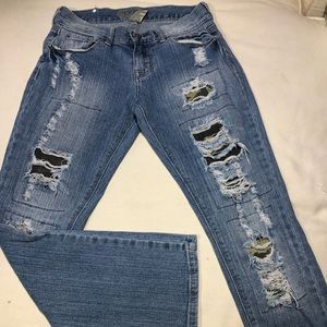 Distressed Denim/ Camo Patched Skinny Jean